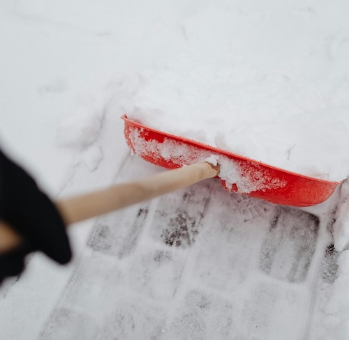 Person snow shoveling