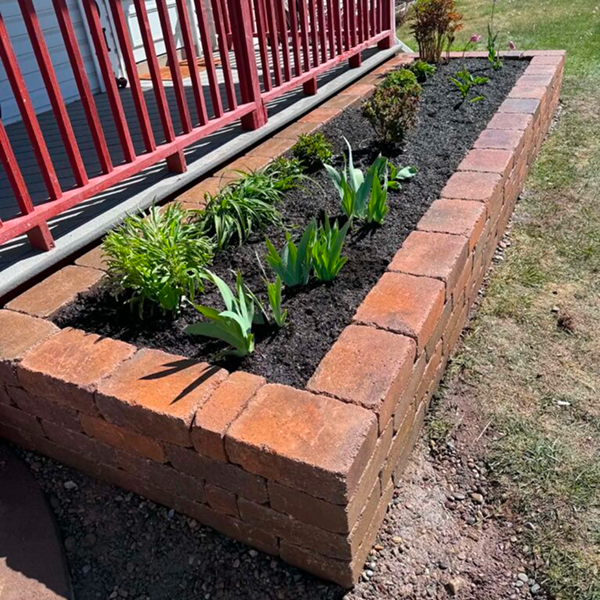 Tumbled concrete block raised garden retaining wall in Idaho Falls ID