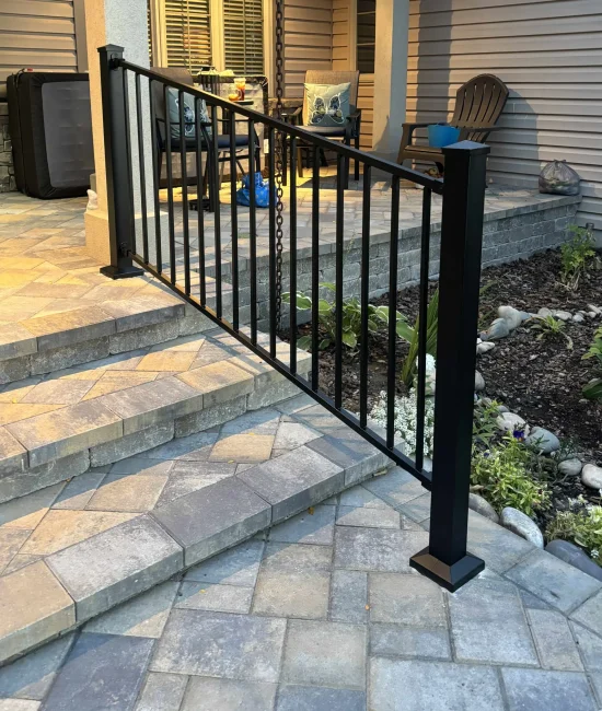 Paver Patio with Steps and Metal Railing in Eastern Idaho